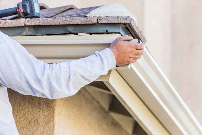 The Ultimate Guide to Gutter Cleaning: Preventing Water Damage at Home